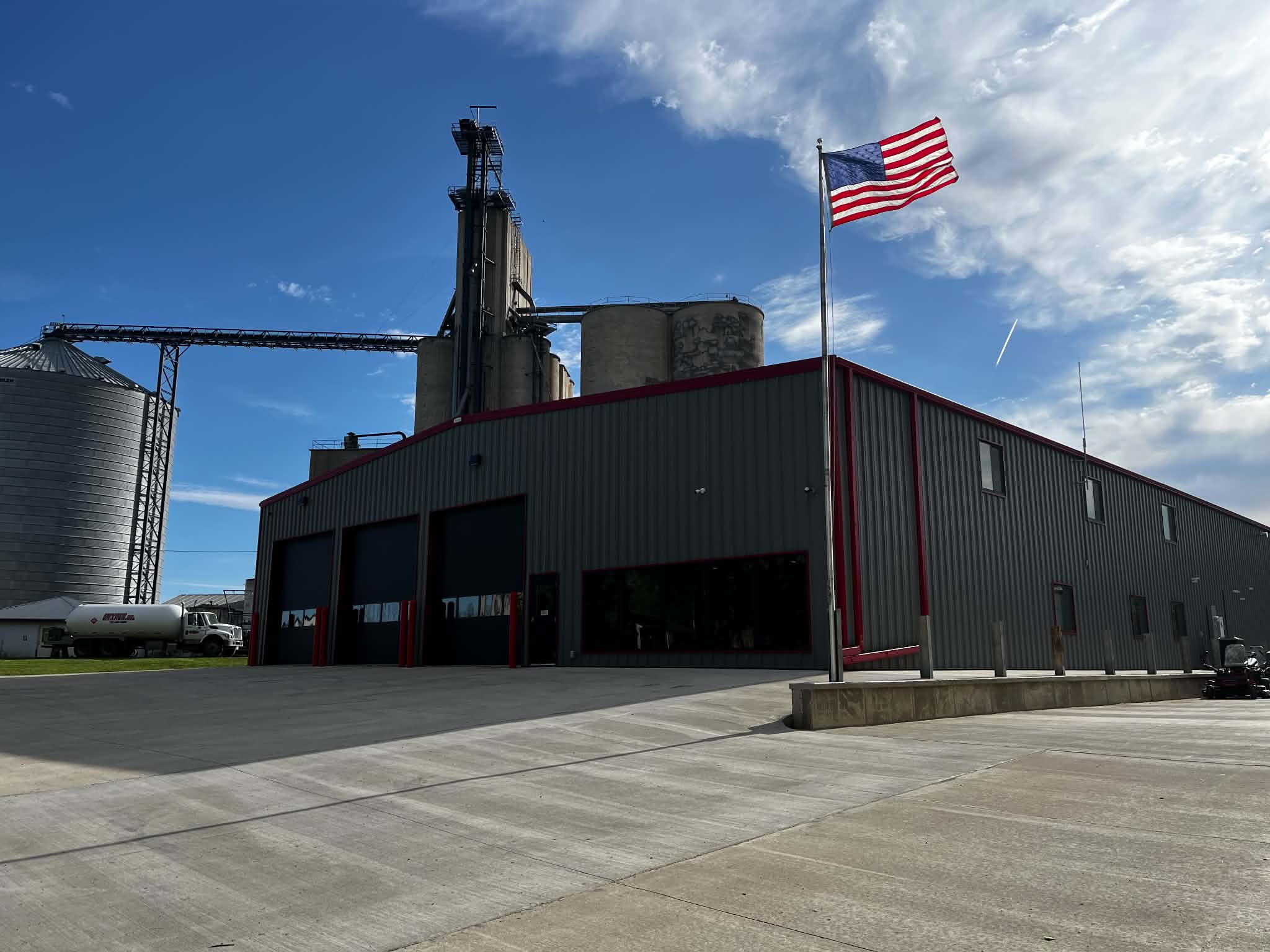 Inwood Iowa New Fire Department Building sitting at an angle with American flag waving